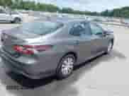 2022 Toyota Camry Hybrid LE with VIN 4T1C31AK9NU036999, listed as a IAAI auction lot 42741455 with 68,970 mi miles and . Bid and sale history available at DreamBid. Image 4.