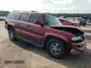 2003 Chevrolet Suburban LT z VIN 1GNFK16Z13J261899, wystawiony jako Copart lot #70806384 z przebiegiem Nie podano mil oraz Szkoda całkowita • Salvage title. Historia ofert i sprzedaży dostępna na DreamBid. Obrazek 4.