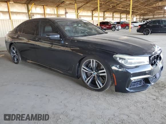 2016 BMW 7 Series 750i с VIN WBA7F0C56GGL99824, выставлен на аукционе Copart как лот 62845125 с пробегом 114 694 миль миль и Списание • Salvage title. История ставок и продаж доступна на DreamBid. Изображение 4.