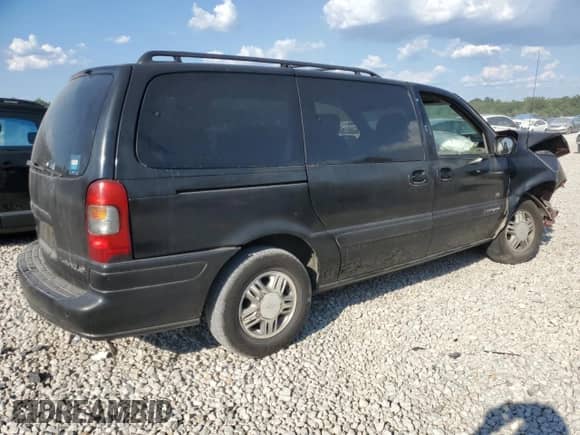 2003 Chevrolet Venture Warner Bros 1SE with VIN 1GNDX13E63D308658, listed as a Copart auction lot 72693504 with 219,212 mi miles and Salvage title. Bid and sale history available at DreamBid. Image 3.