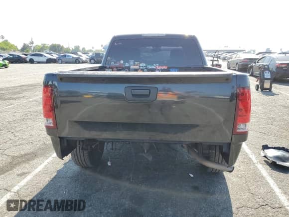 2009 GMC Sierra 1500 with VIN 2GTEC230691130743, listed as a Copart auction lot 60643155 with 140,455 mi miles and Salvage title. Bid and sale history available at DreamBid. Image 6.