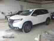 2019 Honda Passport EX-L with VIN 5FNYF8H51KB028703, listed as a IAAI auction lot 42162823 with 74,547 mi miles and . Bid and sale history available at DreamBid. Image 2.