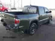 2022 Toyota Tacoma SR5 with VIN 3TMAZ5CN8NM180525, listed as a IAAI auction lot 42750259 with 52,414 mi miles and . Bid and sale history available at DreamBid. Image 4.