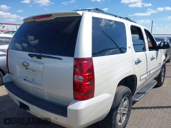 2008 Chevrolet Tahoe LTZ with VIN 1GNFC13J98R233238, listed as a IAAI auction lot 43315701 with Not provided miles and . Bid and sale history available at DreamBid. Image 4.
