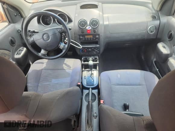 2006 Chevrolet Aveo LT with VIN KL1TG66616B556264, listed as a Copart auction lot 60528345 with 318,128 mi miles and Salvage title. Bid and sale history available at DreamBid. Image 8.