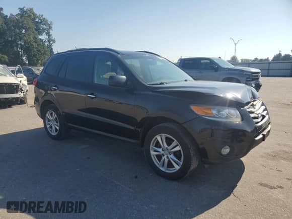 2012 Hyundai Santa Fe Limited с VIN 5XYZKDAG1CG163534, выставлен на аукционе Copart как лот 81422725 с пробегом 161 121 миль миль и Списание • Salvage title. История ставок и продаж доступна на DreamBid. Изображение 4.