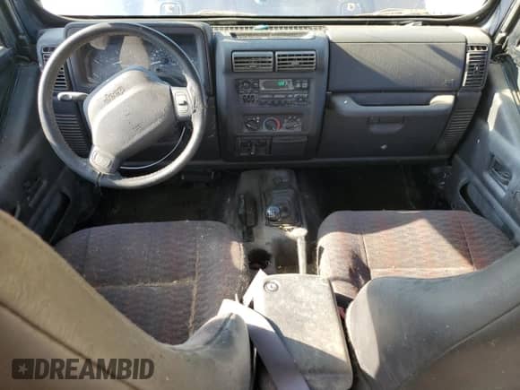 2000 Jeep Wrangler Sport with VIN 1J4FA49S5YP744967, listed as a Copart auction lot 67909665 with 141,990 mi miles and Clean title. Bid and sale history available at DreamBid. Image 8.