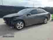 2014 Toyota Camry SE with VIN 4T1BF1FK7EU301981, listed as a Copart auction lot 70094195 with 203,911 mi miles and Salvage title. Bid and sale history available at DreamBid. Image 1.