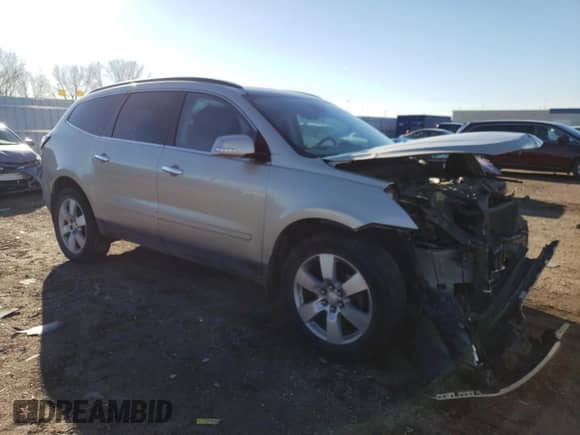 2014 Chevrolet Traverse LTZ с VIN 1GNKVJKD4EJ286170, выставлен на аукционе Copart как лот 80499053 с пробегом 119 738 миль миль и Списание • Salvage title. История ставок и продаж доступна на DreamBid. Изображение 4.