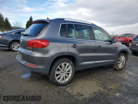2013 Volkswagen Tiguan SE z VIN WVGAV3AX2DW607051, wystawiony jako Copart lot #44391625 z przebiegiem 61 220 mil mil oraz Szkoda całkowita • Salvage title. Historia ofert i sprzedaży dostępna na DreamBid. Obrazek 3.