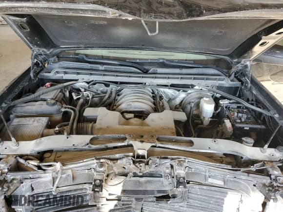 2018 Chevrolet Silverado 1500 LT z VIN 3GCUKREC9JG213996, wystawiony jako Copart lot #70379115 z przebiegiem 104 786 mil mil oraz Szkoda całkowita • Salvage title. Historia ofert i sprzedaży dostępna na DreamBid. Obrazek 11.