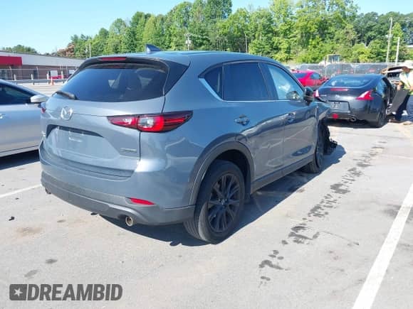 2023 Mazda CX-5 S Preferred z VIN JM3KFBCMXP0103266, wystawiony jako IAAI lot #42549612 z przebiegiem 45 327 mil mil oraz . Historia ofert i sprzedaży dostępna na DreamBid. Obrazek 4.