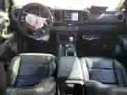 2021 Toyota Tacoma TRD Off Road with VIN 3TMCZ5AN4MM424715, listed as a Copart auction lot 86407685 with 55,946 mi miles and Salvage title. Bid and sale history available at DreamBid. Image 8.