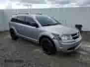 2016 Dodge Journey SE with VIN 3C4PDCAB3GT212053, listed as a Copart auction lot 66263335 with 119,036 mi miles and Clean title. Bid and sale history available at DreamBid. Image 4.