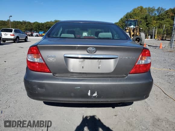 2004 Toyota Camry LE with VIN 4T1BE30KX4U939793, listed as a Copart auction lot 82566955 with 279,475 mi miles and Clean title. Bid and sale history available at DreamBid. Image 6.