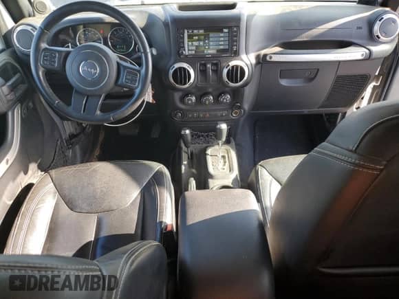 2014 Jeep Wrangler Rubicon with VIN 1C4BJWCG7EL206665, listed as a Copart auction lot 86903384 with 413,442 mi miles and Salvage title. Bid and sale history available at DreamBid. Image 8.