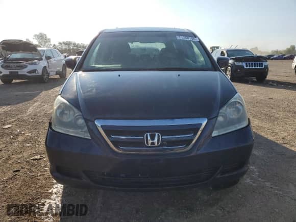 2007 Honda Odyssey EX-L с VIN 5FNRL38707B077318, выставлен на аукционе Copart как лот 71250165 с пробегом 174 272 миль миль и Списание • Salvage title. История ставок и продаж доступна на DreamBid. Изображение 5.