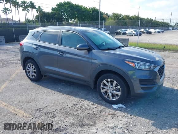2021 Hyundai Tucson Value with VIN KM8J33A40MU323196, listed as a IAAI auction lot 42051007 with 84,446 mi miles and . Bid and sale history available at DreamBid. Image 1.