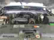 2006 Chevrolet Silverado 1500 LT3 z VIN 2GCEK13T561192377, wystawiony jako Copart lot #81331635 z przebiegiem 306 551 mil mil oraz Szkoda całkowita • Salvage title. Historia ofert i sprzedaży dostępna na DreamBid. Obrazek 11.