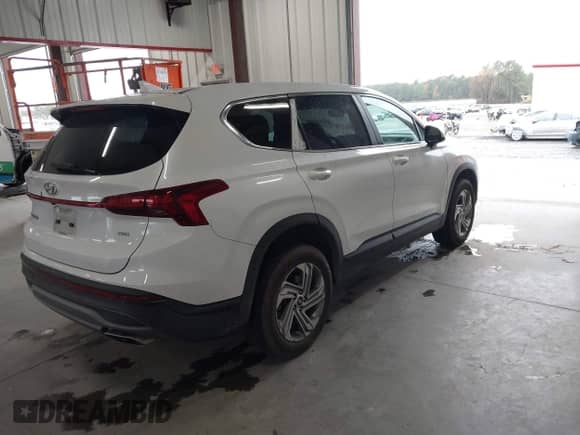 2021 Hyundai Santa Fe SE with VIN 5NMS1DAJ2MH352913, listed as a IAAI auction lot 43548098 with 93,758 mi miles and . Bid and sale history available at DreamBid. Image 4.
