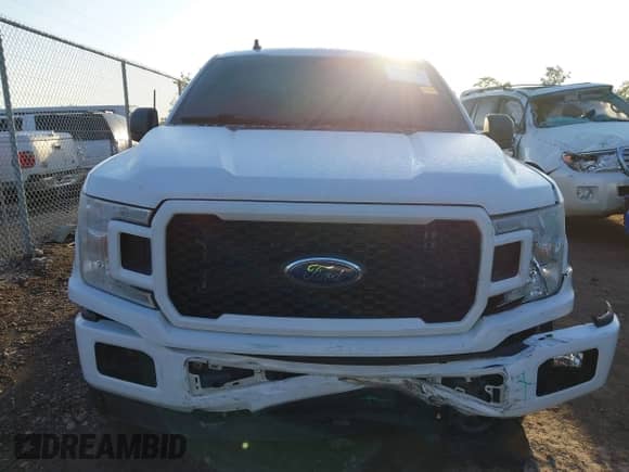 2020 Ford F-150 XL with VIN 1FTEW1EP1LKD07153, listed as a IAAI auction lot 43319424 with 86,436 mi miles and . Bid and sale history available at DreamBid. Image 12.