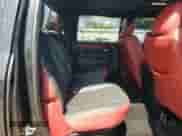 2016 Ram 1500 Rebel z VIN 1C6RR7YT1GS122621, wystawiony jako Copart lot #69390835 z przebiegiem 144 898 mil mil oraz Czysty tytuł • Clean title. Historia ofert i sprzedaży dostępna na DreamBid. Obrazek 10.