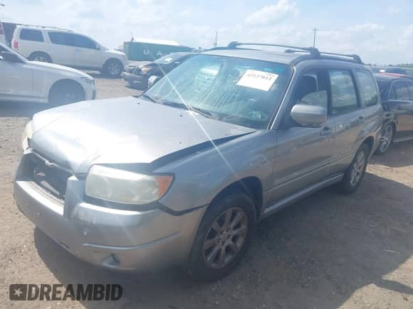 2008 Subaru Forester X with VIN JF1SG65638H722196, listed as a IAAI auction lot 42137812 with 176,065 mi miles and . Bid and sale history available at DreamBid. Image 2.