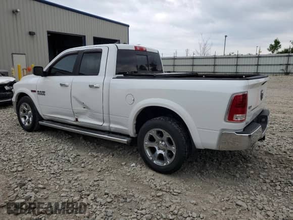 2014 Ram 1500 Laramie с VIN 1C6RR7JMXES303054, выставлен на аукционе Copart как лот 61168405 с пробегом 135 823 миль миль и Чистый • Clean title. История ставок и продаж доступна на DreamBid. Изображение 2.