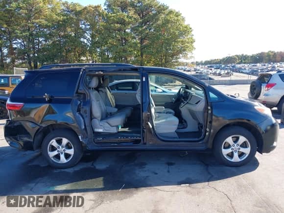 2016 Toyota Sienna LE with VIN 5TDKK3DCXGS761666, listed as a IAAI auction lot 43476094 with 209,689 mi miles and . Bid and sale history available at DreamBid. Image 6.