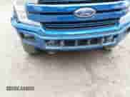 2018 Ford F-150 XL z VIN 1FTEW1EP0JFA87509, wystawiony jako IAAI lot #42992361 z przebiegiem 142 397 mil mil oraz . Historia ofert i sprzedaży dostępna na DreamBid. Obrazek 6.