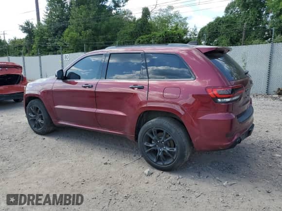2021 Jeep Grand Cherokee 80th Anniversary with VIN 1C4RJFBG7MC512683, listed as a Copart auction lot 68159615 with 32,574 mi miles and Salvage title. Bid and sale history available at DreamBid. Image 2.
