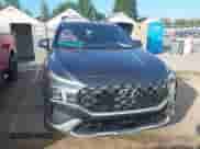 2021 Hyundai Santa Fe Calligraphy z VIN 5NMS5DAL6MH358848, wystawiony jako IAAI lot #42823393 z przebiegiem 54 199 mil mil oraz . Historia ofert i sprzedaży dostępna na DreamBid. Obrazek 13.