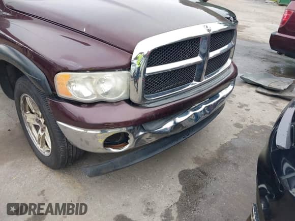 2004 Dodge 1500 SLT with VIN 1D7HU18D34S753235, listed as a IAAI auction lot 42971907 with 120,017 mi miles and . Bid and sale history available at DreamBid. Image 6.
