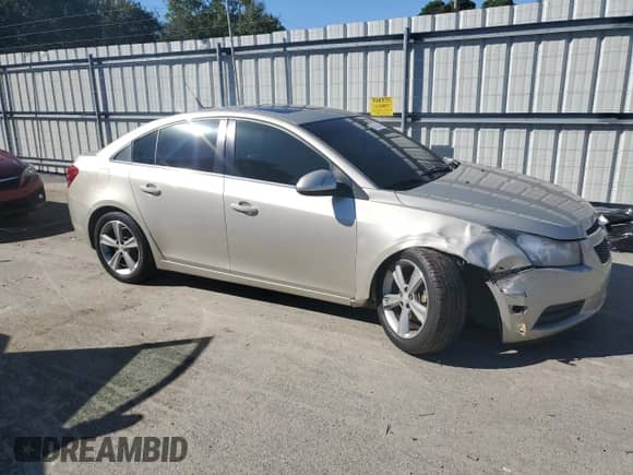 2014 Chevrolet Cruze 2LT z VIN 1G1PE5SB6E7423460, wystawiony jako Copart lot #86853305 z przebiegiem 192 898 mil mil oraz Szkoda całkowita • Salvage title. Historia ofert i sprzedaży dostępna na DreamBid. Obrazek 4.