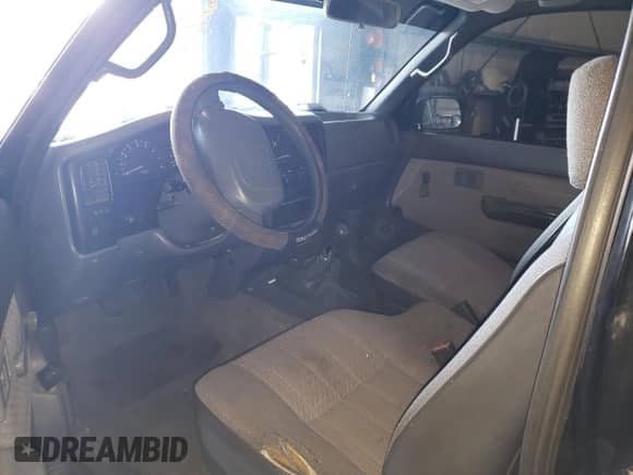 1997 Toyota Tacoma z VIN 4TAWN72N8VZ275224, wystawiony jako Copart lot #53267355 z przebiegiem 258 016 mil mil oraz Szkoda całkowita • Salvage title. Historia ofert i sprzedaży dostępna na DreamBid. Obrazek 8.