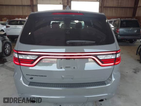 2021 Dodge Durango SXT Plus with VIN 1C4RDJAG0MC558321, listed as a IAAI auction lot 39679795 with 69,071 mi miles and . Bid and sale history available at DreamBid. Image 16.