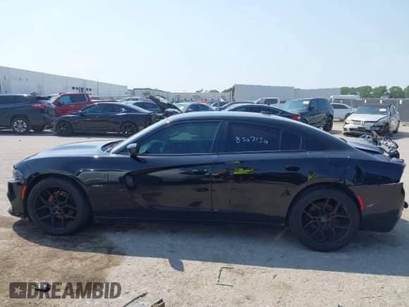 2018 Dodge Charger R/T with VIN 2C3CDXCT7JH209866, listed as a IAAI auction lot 43157349 with 163,502 mi miles and . Bid and sale history available at DreamBid. Image 14.