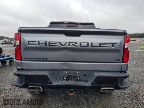 2021 Chevrolet Silverado 1500 LT Trail Boss with VIN 1GCPYFED5MZ260501, listed as a Copart auction lot 82402515 with 59,305 mi miles and Salvage title. Bid and sale history available at DreamBid. Image 6.