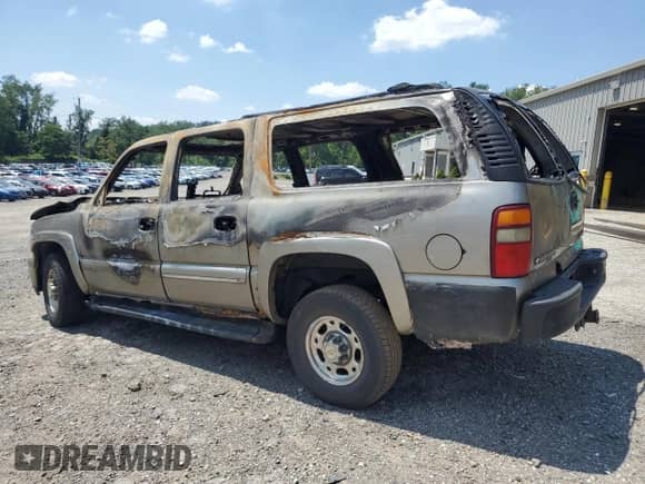 2002 Chevrolet Suburban LT z VIN 3GNGK26G12G301147, wystawiony jako Copart lot #65392395 z przebiegiem Nie podano mil oraz Szkoda całkowita • Salvage title. Historia ofert i sprzedaży dostępna na DreamBid. Obrazek 2.