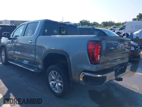 2021 GMC Sierra 1500 SLT with VIN 3GTP8DED5MG415357, listed as a IAAI auction lot 43034232 with 62,161 mi miles and . Bid and sale history available at DreamBid. Image 3.