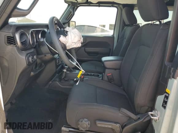 2023 Jeep Wrangler Sport with VIN 1C4HJXAG5PW659672, listed as a Copart auction lot 59034675 with 23,826 mi miles and Salvage title. Bid and sale history available at DreamBid. Image 7.