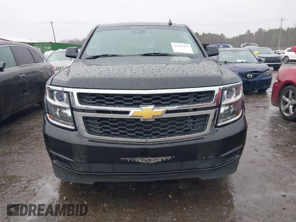 2016 Chevrolet Tahoe LS z VIN 1GNSKAKCXGR458352, wystawiony jako IAAI lot #41541099 z przebiegiem 93 879 mil mil oraz . Historia ofert i sprzedaży dostępna na DreamBid. Obrazek 11.
