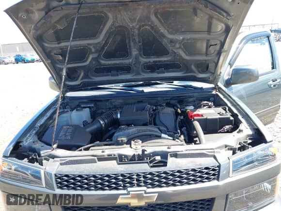 2011 Chevrolet Colorado 1LT z VIN 1GCHTCFE5B8113848, wystawiony jako IAAI lot #42781184 z przebiegiem 64 485 mil mil oraz . Historia ofert i sprzedaży dostępna na DreamBid. Obrazek 10.