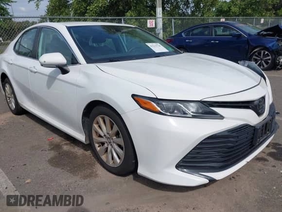 2020 Toyota Camry LE with VIN 4T1L11AKXLU329121, listed as a IAAI auction lot 43233720 with 46,485 mi miles and . Bid and sale history available at DreamBid. Image 1.