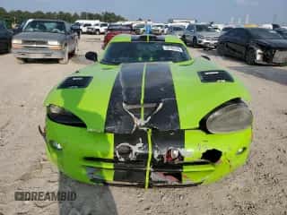 1994 Dodge Viper with VIN 1B3BR65E8RV101309, listed as a Copart auction lot 50169165 with 70,768 mi miles and Salvage title. Bid and sale history available at DreamBid. Image 5.