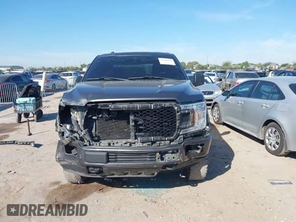 2019 Ford F-150 XL with VIN 1FTEW1E55KKC31708, listed as a IAAI auction lot 43309999 with 107,882 mi miles and . Bid and sale history available at DreamBid. Image 12.