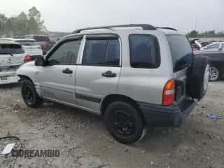 2002 Chevrolet Tracker with VIN 2CNBE13C926934704, listed as a Copart auction lot 70717194 with 189,076 mi miles and Salvage title. Bid and sale history available at DreamBid. Image 2.