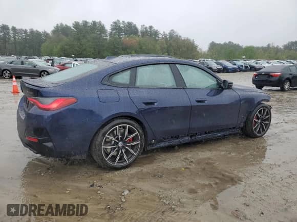 2022 BMW 4 Series M440i xDrive с VIN WBA13AW04NFM50227, выставлен на аукционе Copart как лот 55770745 с пробегом 36 788 миль миль и Списание • Salvage title. История ставок и продаж доступна на DreamBid. Изображение 3.
