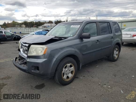 2010 Honda Pilot LX with VIN 5FNYF4H20AB014742, listed as a Copart auction lot 87434435 with 141,802 mi miles and Salvage title. Bid and sale history available at DreamBid. Image 1.