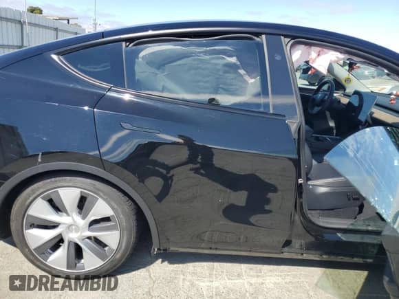 2023 Tesla Model Y Long Range с VIN 7SAYGAEE3PF903721, выставлен на аукционе Copart как лот 68774815 с пробегом Не указан миль и Списание • Salvage title. История ставок и продаж доступна на DreamBid. Изображение 10.